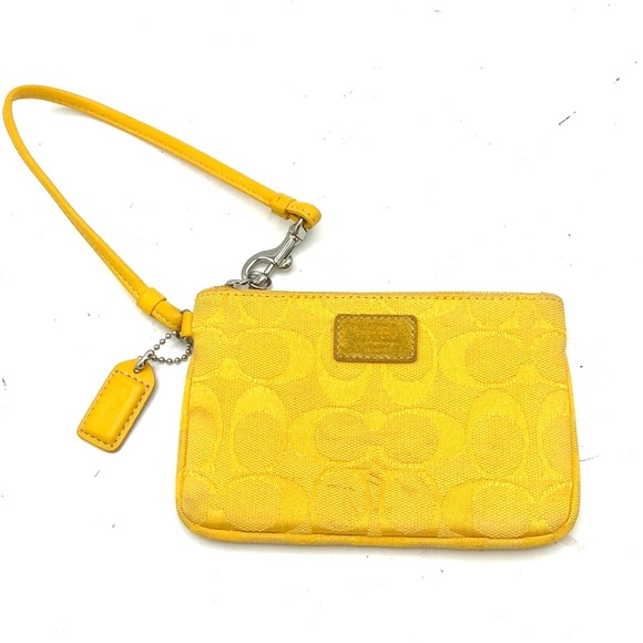 Coach Handbags - COACH Yellow wristlet